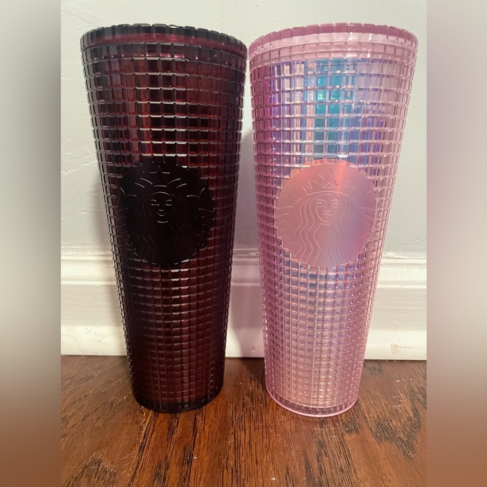 Two Starbucks cups and straws missing